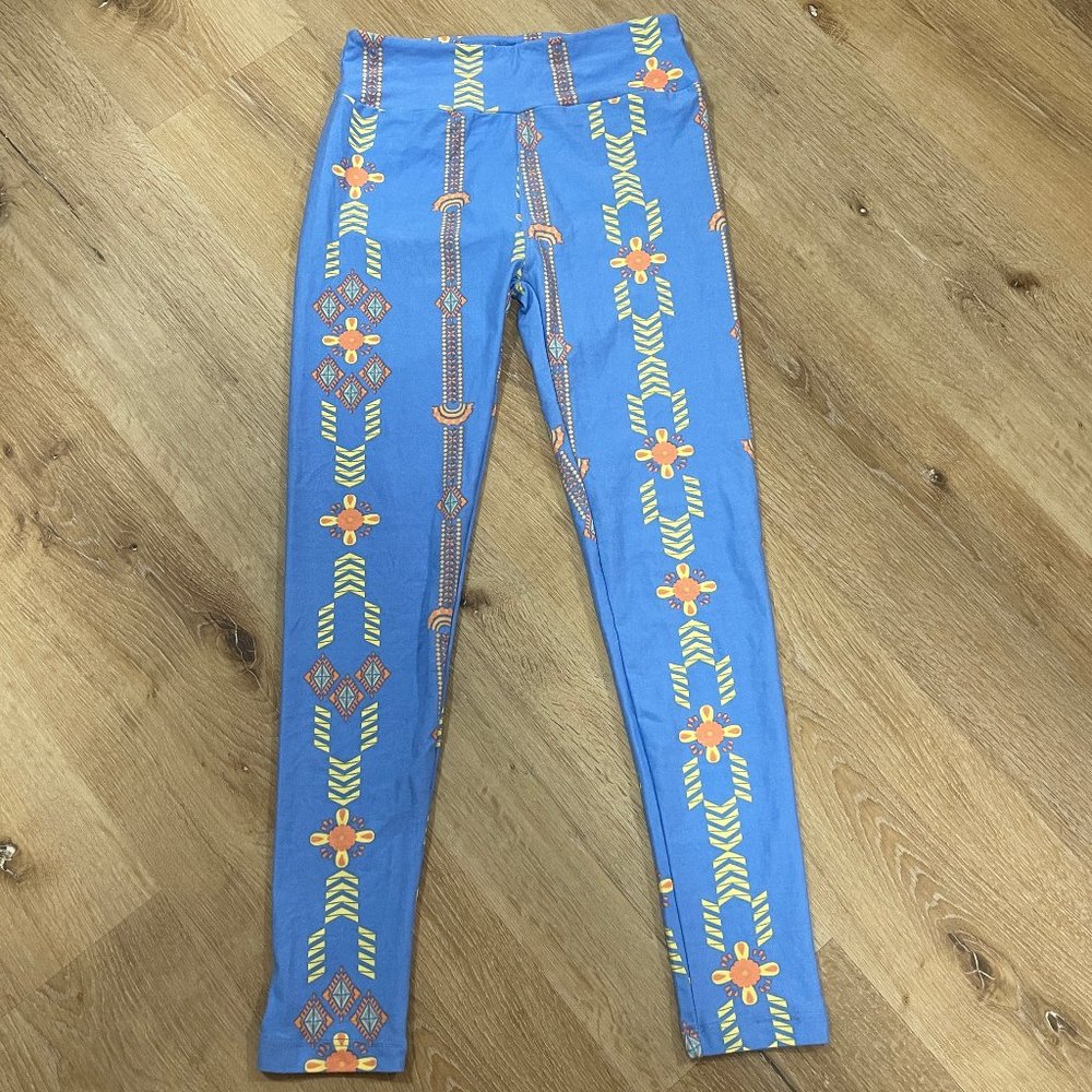 Cornflower Blue patterned leggings in OS. NEVER WORN…20% off 3+ items